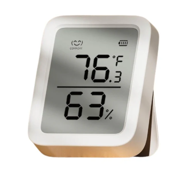 Zbliżenie na wyświetlacz SwitchBot Meter Plus pokazujący 23.2°C, 48% wilgotności, trendy wzrostowe i inteligentne ikonki klimatu